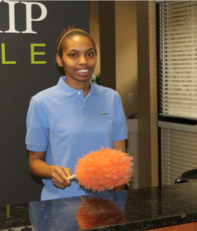 greenville-sc-office-cleaning-image1 Team Member dusting the Offices. Greenville